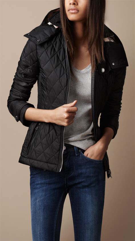 burberry black quilted jacket w fur hood|Burberry cashmere cape coat.